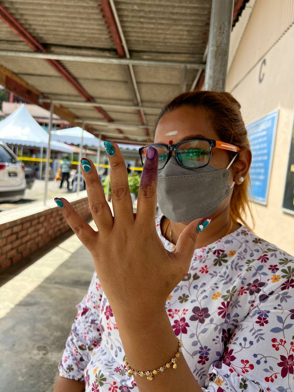 Logeswari Manikam, 34, feels extremely excited to vote for the first time and is hoping for ‘a new Malaysia’ at the polling station in Kolej Tingkatan Enam Puchong Batu 8 after she casting her ballot for the Subang parliamentary constituency. The Vibes pic, November 19, 2022