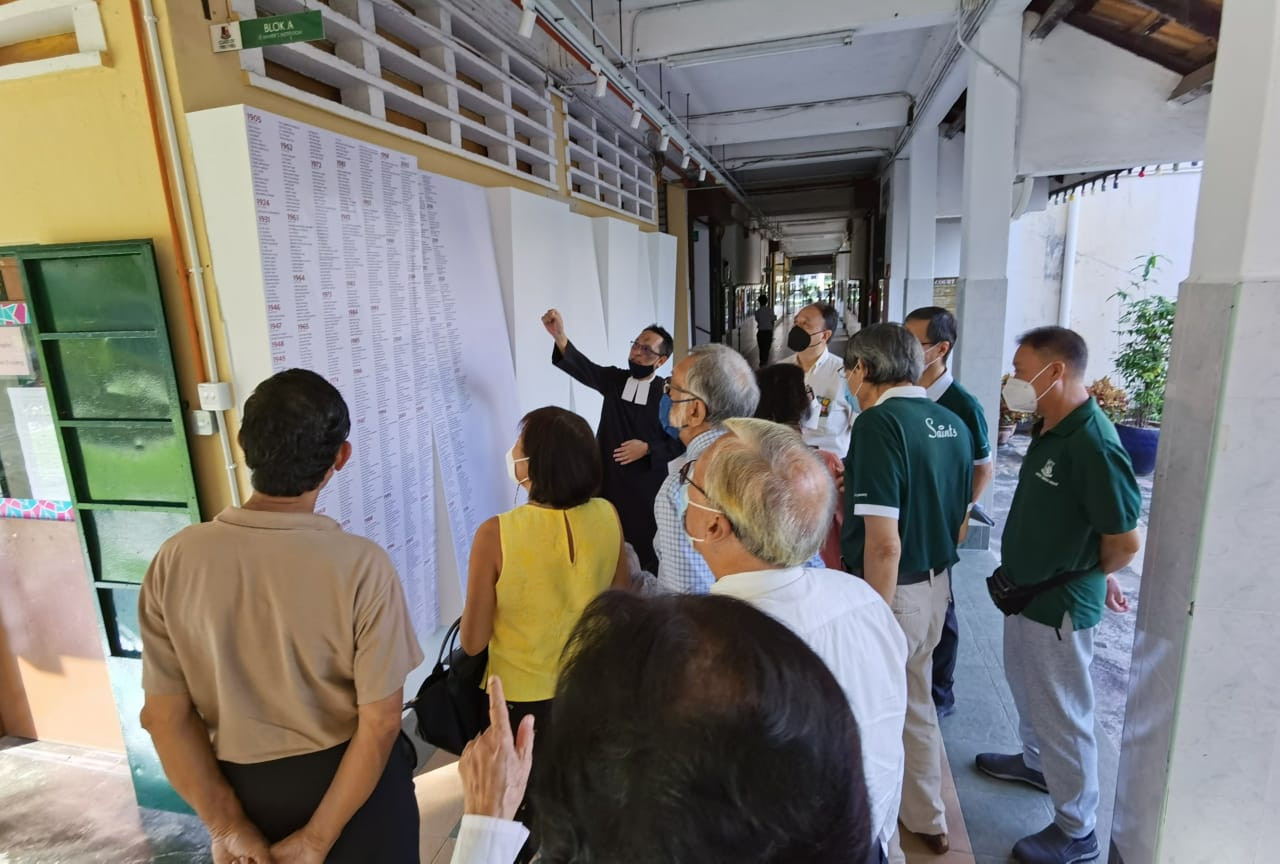 Penang’s St Xavier’s Institution brother-director Jason Blakie showing the student wall, which lists the names of some 35,000 of the school’s graduates since its inception. – Pic courtesy of St Xavier’s Institution, May 29, 2022