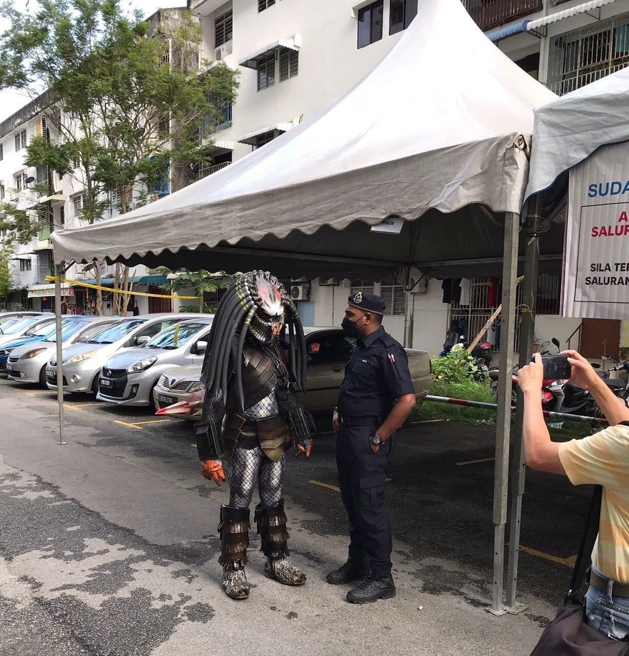 Predator halted by the law... A voter dressed as a famous Hollywood science fiction character was turned away from a polling centre in Penang today. – Social media pic, November 19, 2022