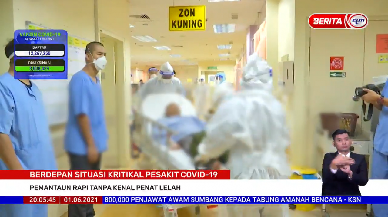 Sg Buloh Hospital frontliners in full PPE tending to Covid-19 patients, the number of which has surged in recent weeks. – Screen grab, June 2, 2021 