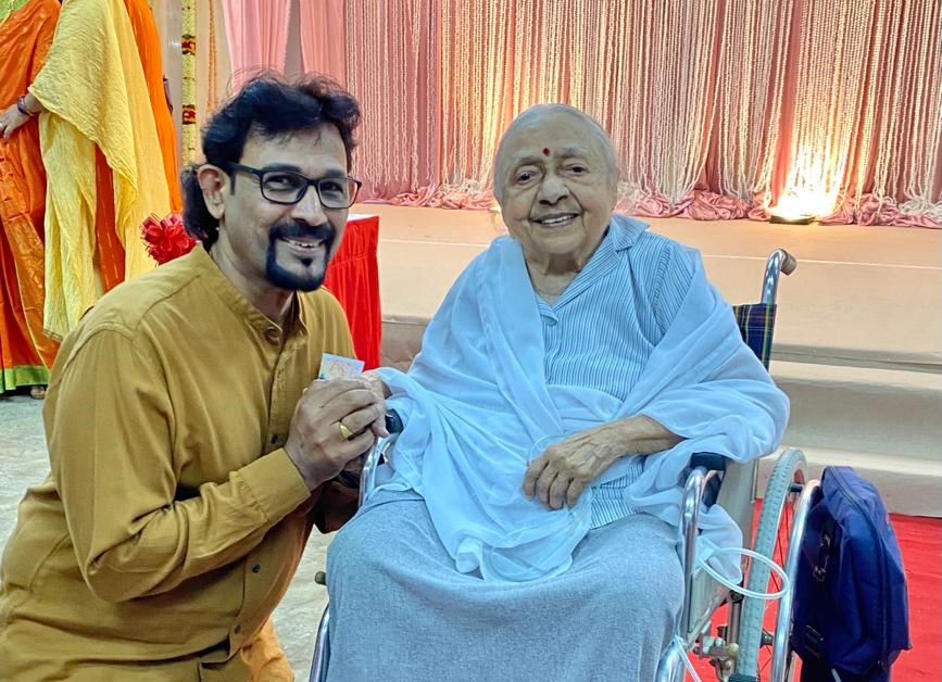 Ravindran Raman Kutty (left) with Mother Mangalam during her 97th birthday celebration at the Pure Life Society on May 20. – Pic courtesy of Ravindran Raman Kutty, June 12, 2023