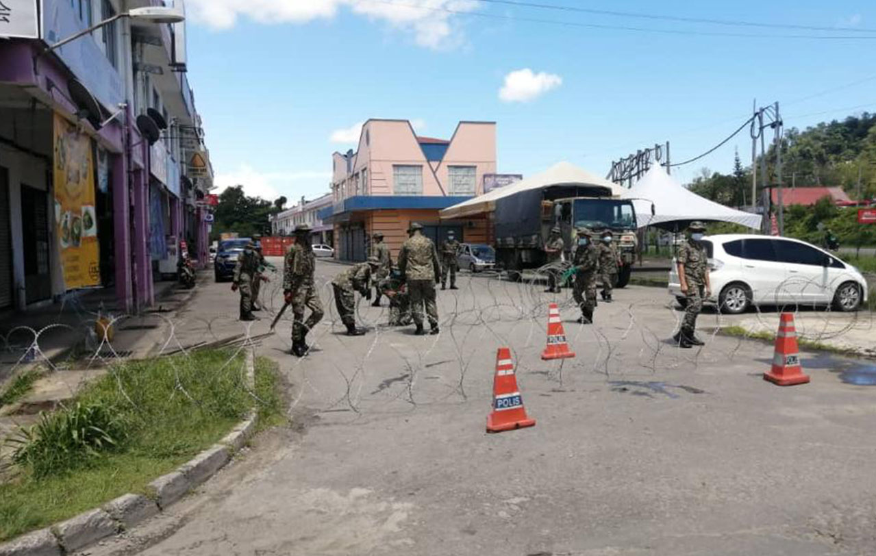 A journalist was shouted at while trying to take a picture of security personnel installing barbwire, seen in this photo shared by a Country Heights Apartment occupant in the residents’ WhatsApp group. – File pic, June 18, 2021