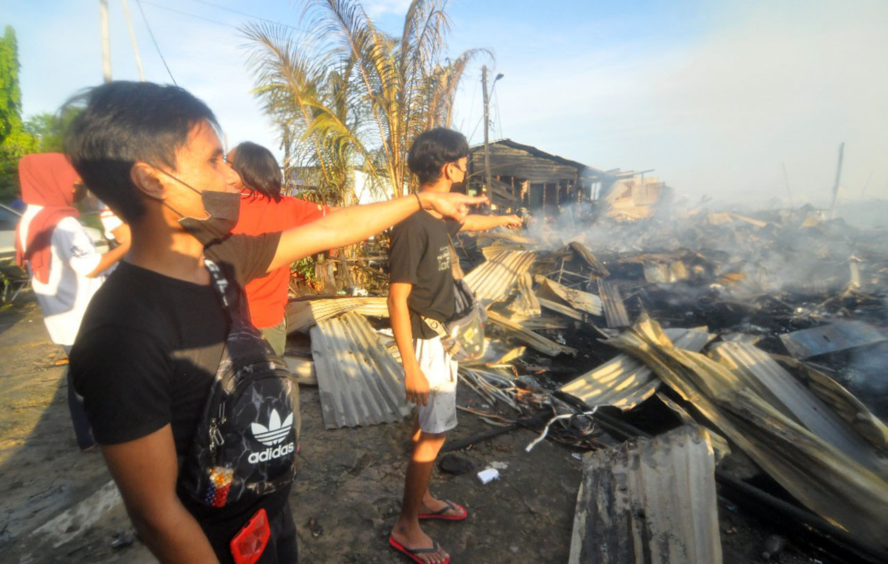 The fire in Kg Tanjung Aru Baru is the third fire tragedy to hit the village this year. – ESSAM ABDULLAH/The Vibes pic, July 18, 2021