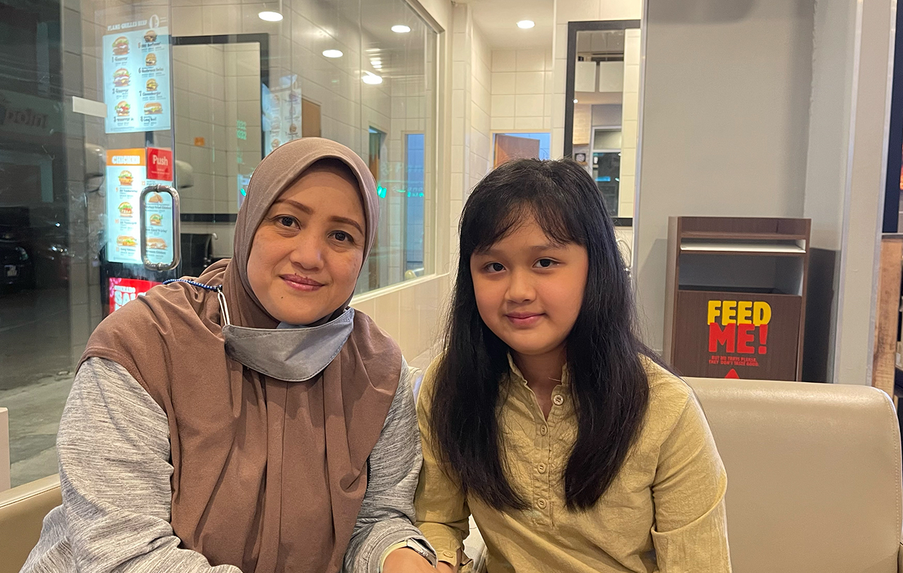Mother and housewife Syllie Suryantie John (left) said Nurhazwa Ayshah is not only an excellent student but has always had an entrepreneurial streak. – JASON SANTOS/The Vibes pic, April 17, 2022