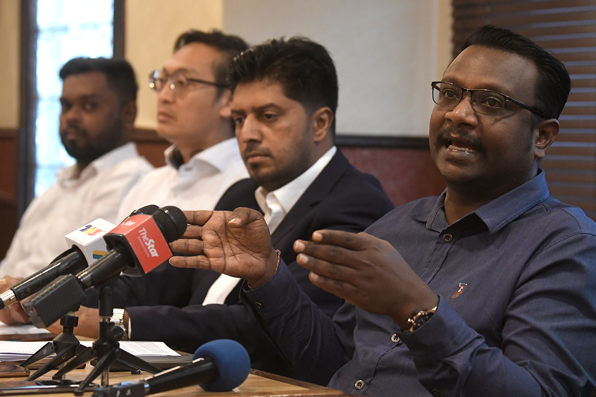 Dayalan Sreebalan (R) speaks during a press conference at a restaurant in Kuala Lumpur on June 5, 2024. – The Vibes pic by Najjua Zulkefli