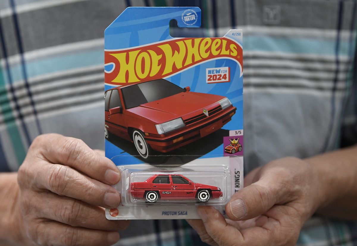 Retired businessman Yap Kim Bok, 75 shows off a Hot Wheels Proton Saga. The Vibes pic by Najjua Zulkefli, August 4, 2024. 