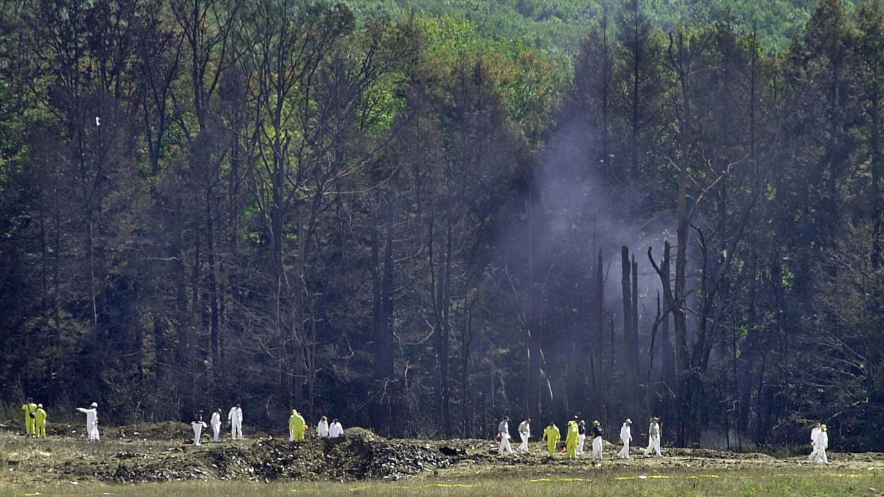 Investigators combing the crash site of United Airlines Flight 93, which was en route to the Capitol building, in Shanksville, Pennsylvania, on September 11, 2001. – File pic, September 11, 2021
