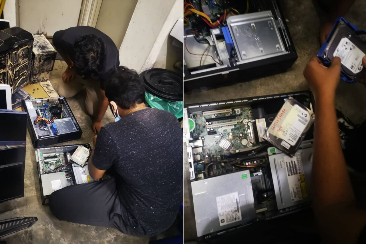 Pukalenthi Theviannan’s technical team repairing some of the computers they received. – Pic courtesy of Pukalenthi Theviannan, December 31, 2021