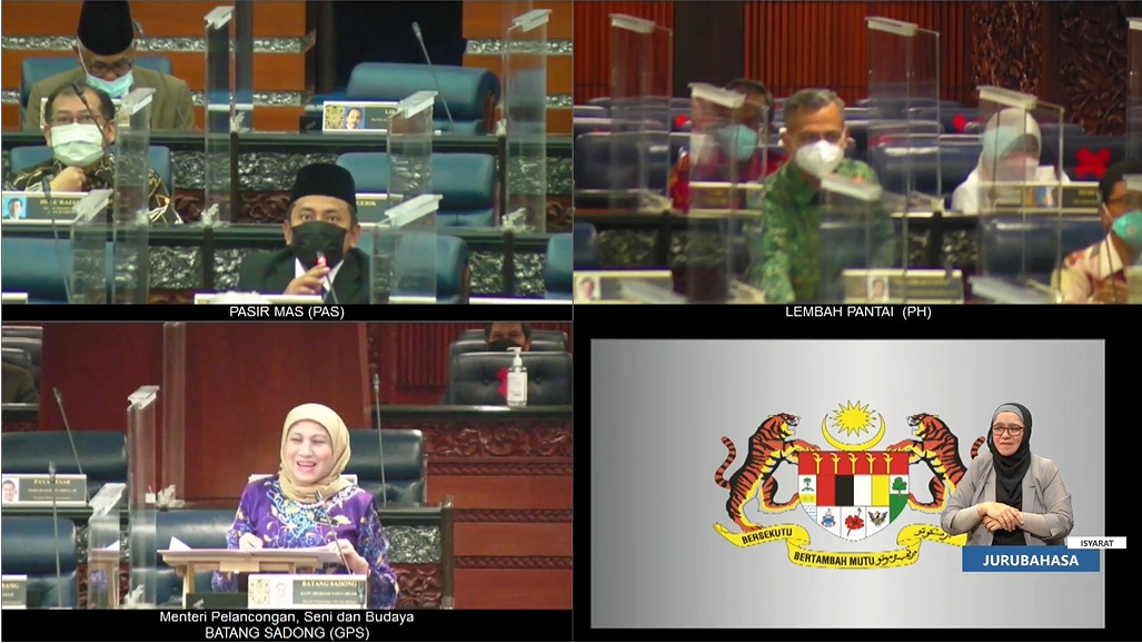 Culture minister Datuk Seri Nancy Shukri (bottom left) and Lembah Pantai MP (top right) in batik at Dewan Rakyat today. – Screen grab, October 28, 2021