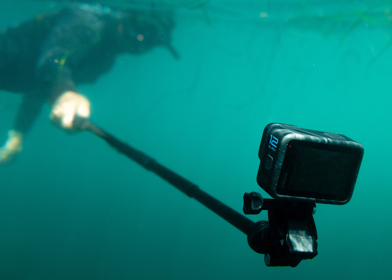 Optional new extension pole with remote button can be used for water activities. – GoPro pic