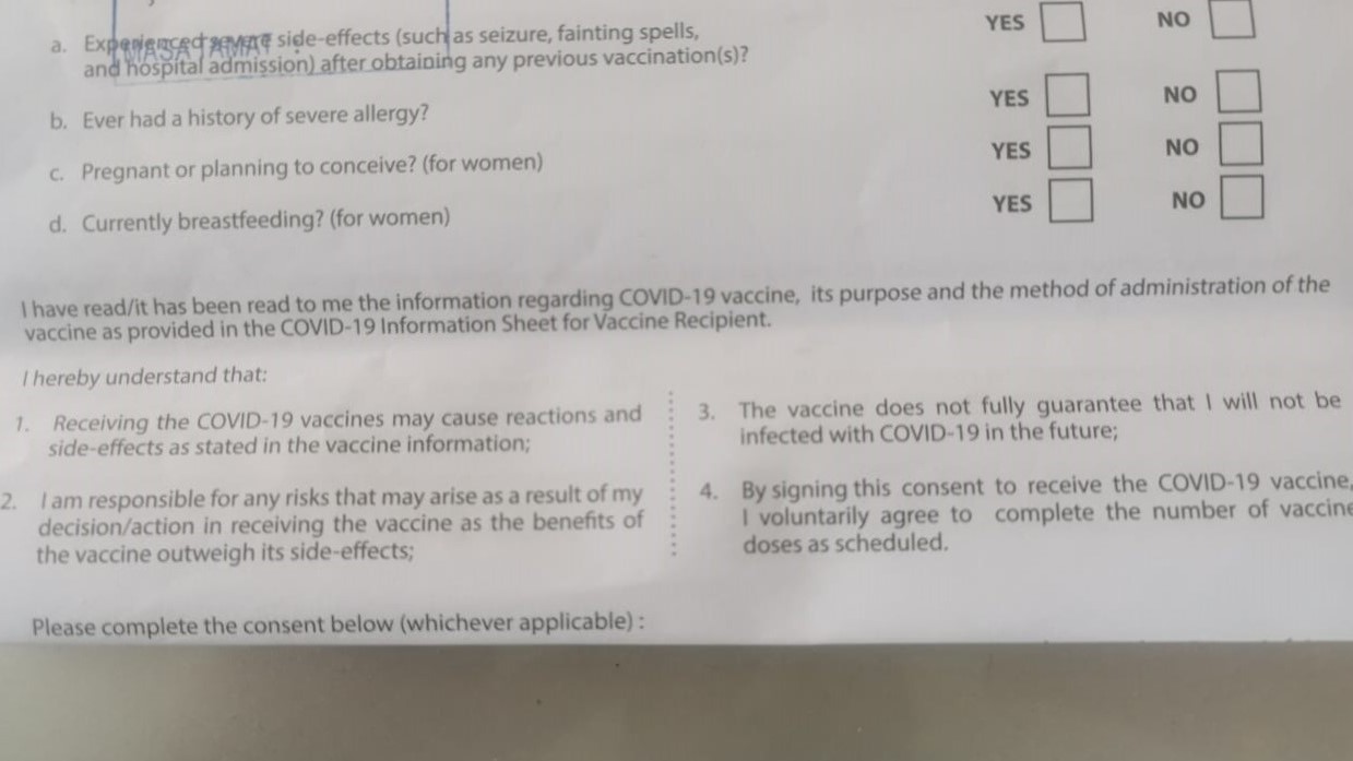 Part of the indemnity form handed out during the National Covid-19 Immunisation Programme. – File pic, July 12, 2021