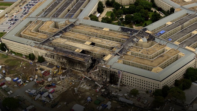 Emergency teams at the west side of the Pentagon after al-Qaeda’s coordinated attacks on 9/11. – US Defence Dept pic, September 11, 2021