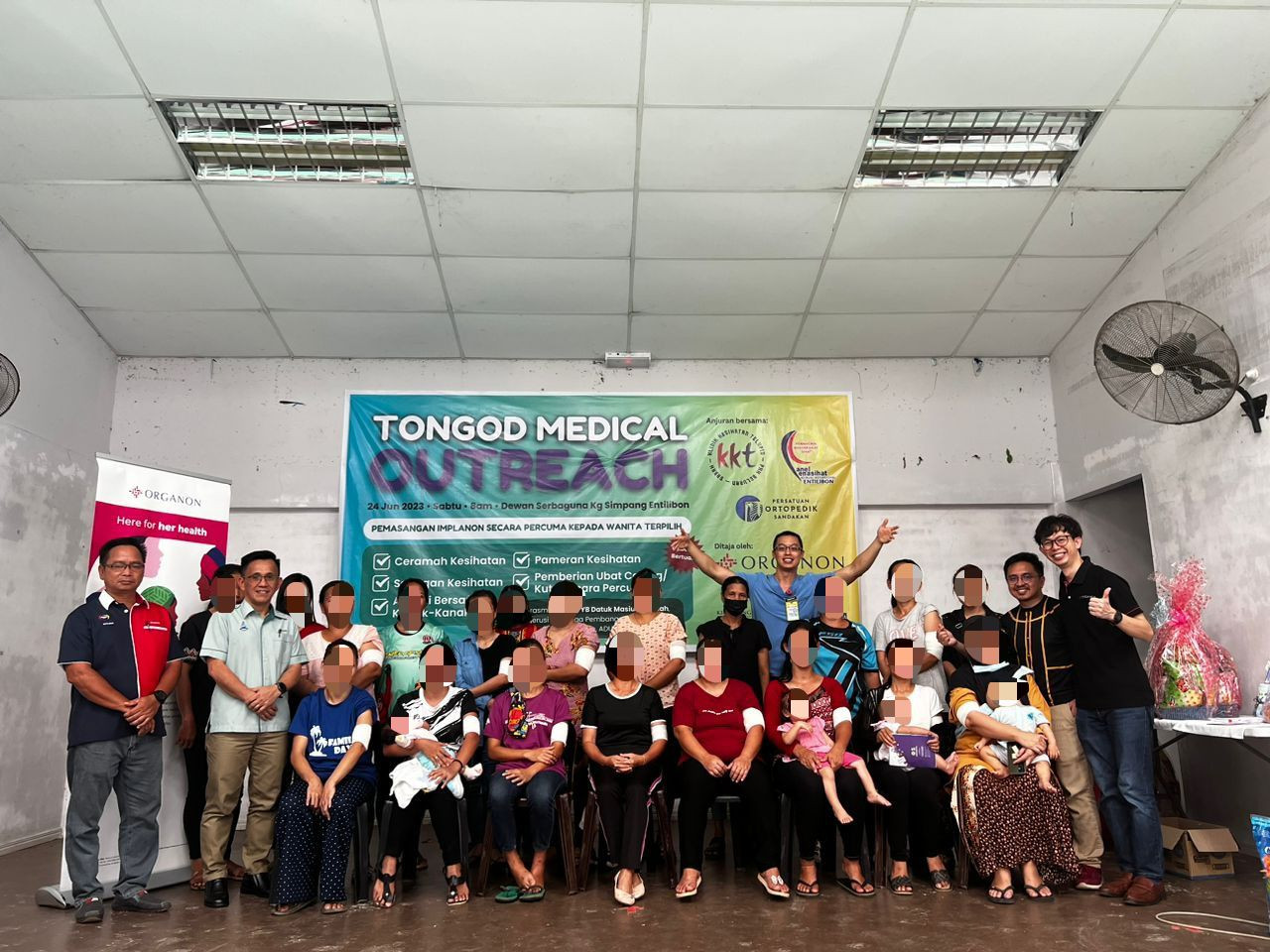 Dr Timothy Cheng (in blue, standing) hopes the outreach programme would also become an eye-opener for the government and MoH on the need for more contraceptive supplies in interior areas in Sabah such as Tongod. – Sandakan Orthopaedic Association pic, July 1, 2023