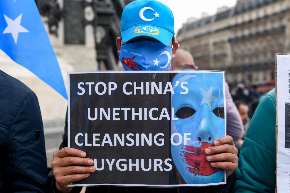 A protester at a rally in support of China’s largely Muslim Uighur community. Beijing has repeatedly been accused of harvesting the organs of detainees in the country. – AFP pic, June 15, 2021