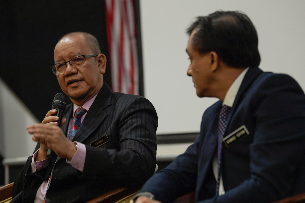 Finas chairman Zakaria Abdul Hamid (left) has been called on to step down following alleged failures to look after the welfare of workers in the sector. – Bernama pic, February 8, 2021