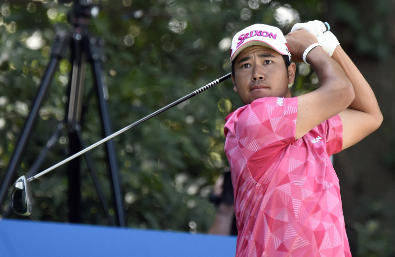 Matsuyama holds off Schauffele to win historic Masters title