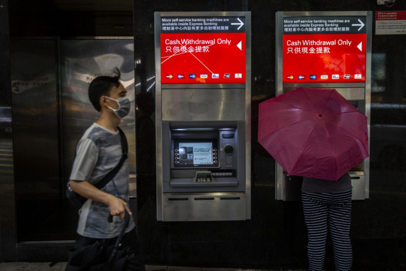 Asia markets mixed as virus worries temper strong Wall St lead