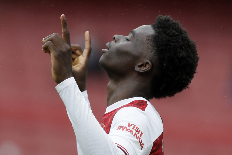 Arsenal's Saka celebrates England call by sinking Blades ...