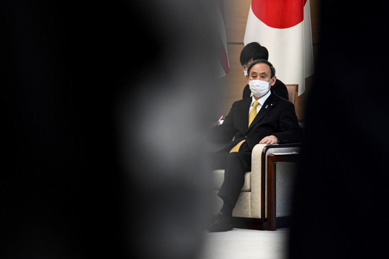 Japan on 'maximum alert' after record virus cases: PM
