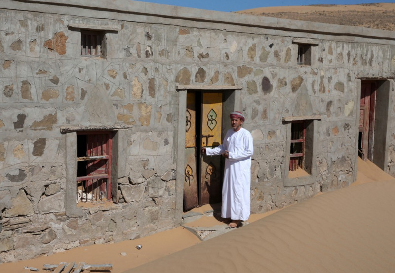 Omanis revive memory of village swallowed by desert