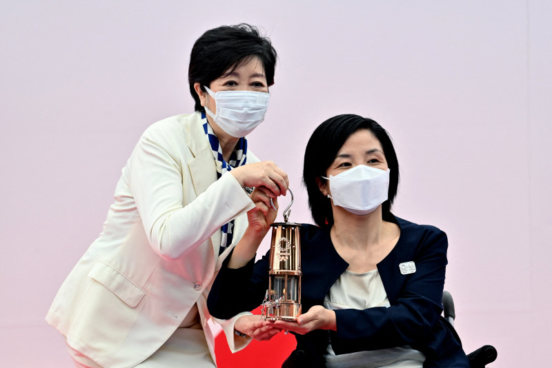 Olympic flame arrives in Tokyo for no-spectator relay