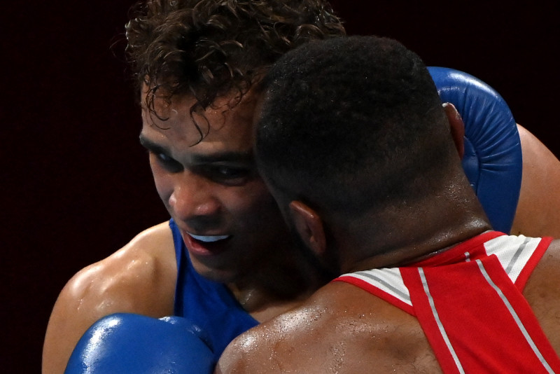 Youness Baalla takes a bite out of opponent during Olympic bout