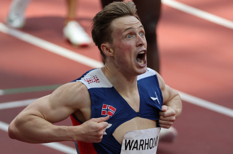 ‘Maniac’ Karsten Warholm smashes own world record to win 400m hurdles gold