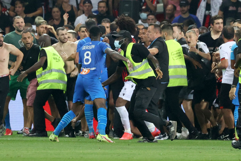 French football wrestles with violence in stadiums as fans return