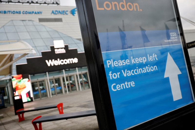 England opens mass vaccination sites as virus spike fears spread