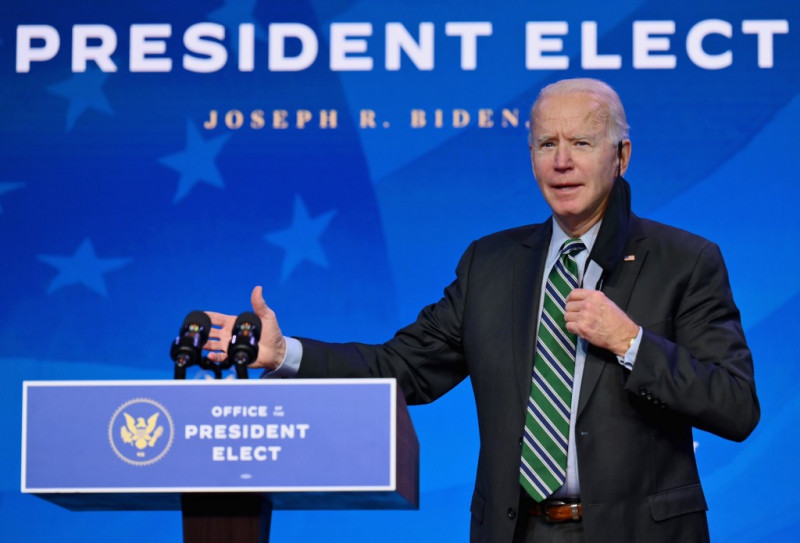 Biden pushes unity ahead of take over of crisis-laden White House