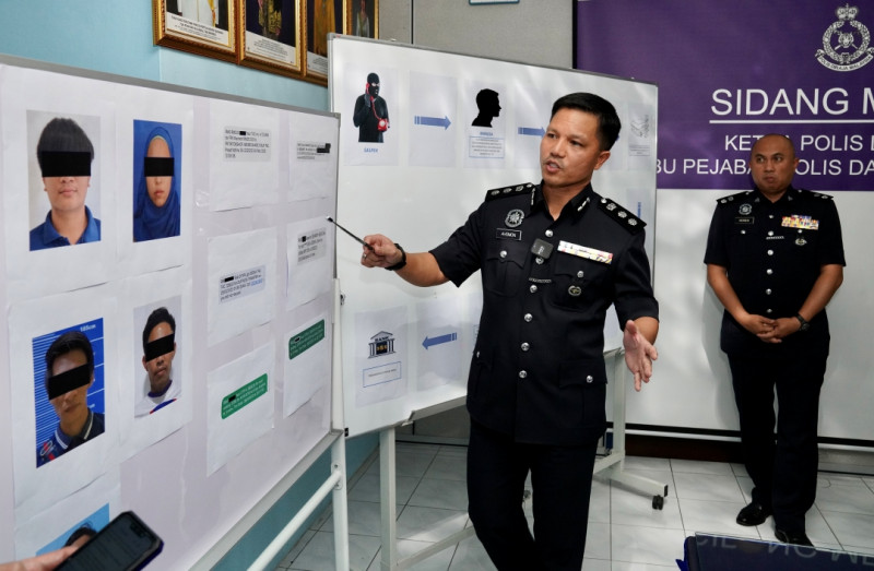 Police tracking down 14-second RM1 mil bank scam suspect 