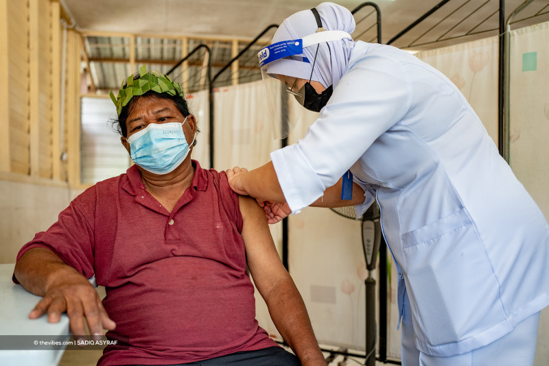 ‘Vaccination icons’: 40 Tok Batin get jab to help dispel shot hesitancy in Perak