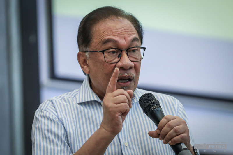 Vote to reclaim Malaysia from ‘robbers’: Anwar