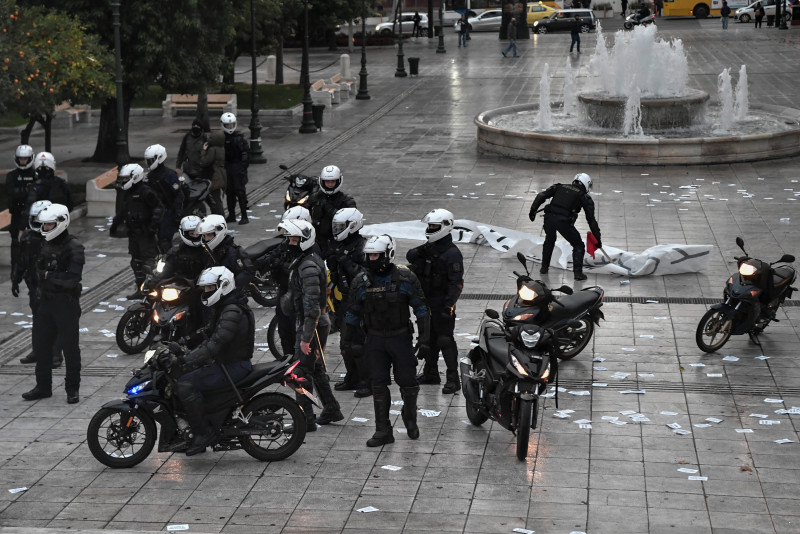 Greek police arrest dozens at march in memory of slain teen