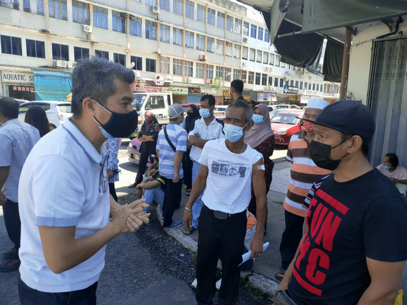 Some turned away as Sandakan folk swarm walk-in centre from 5am