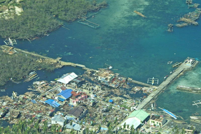 12 dead as powerful typhoon batters the Philippines
