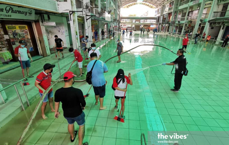 Sabah parties hit the ground cleaning, delivering aid as rainfall stops