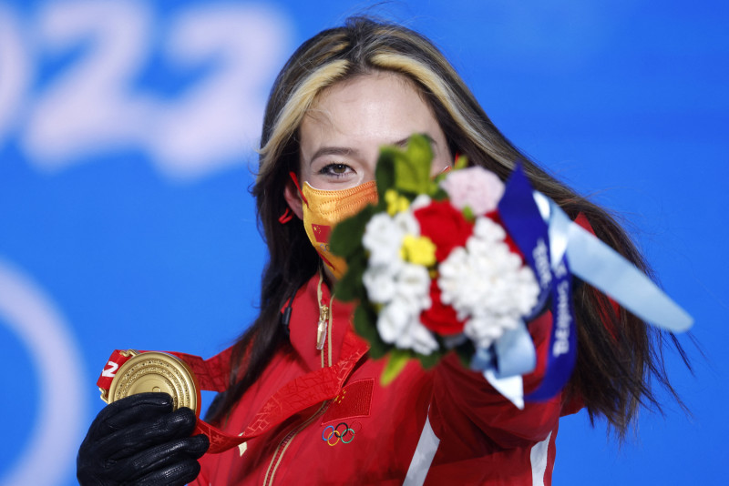 China celebrates record Winter Olympics haul − and beating US