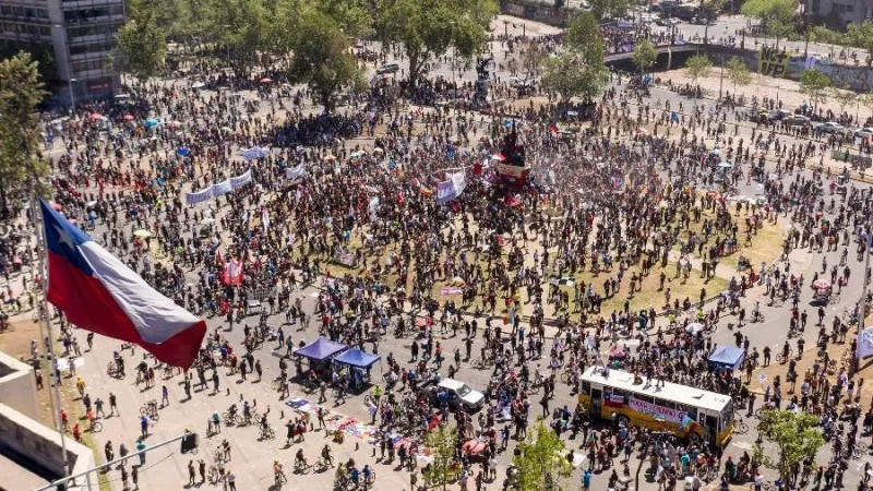 Thousands take to Chile streets to mark protest movement anniversary