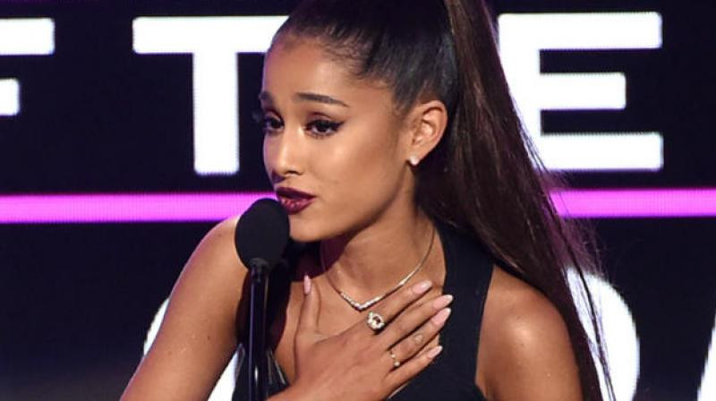 Ariana Grande drops sultry new album, backs Biden