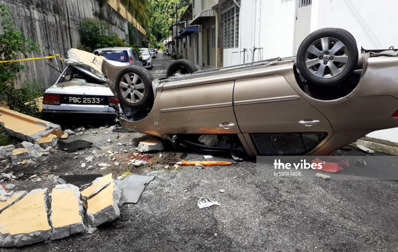 Woman killed after car knocks her through wall, falls