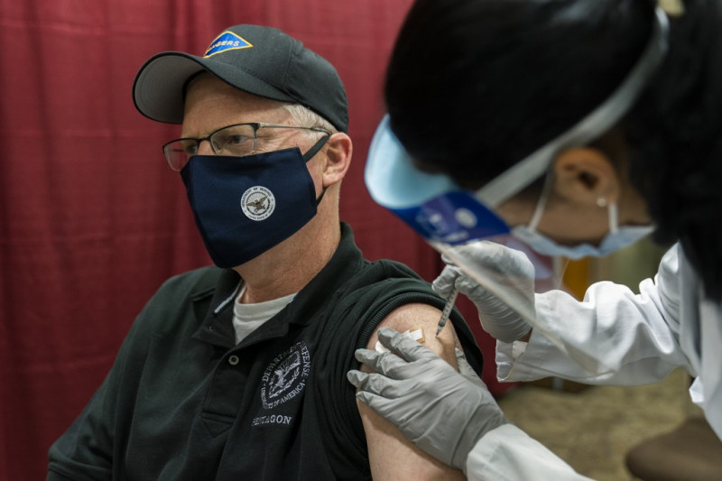 Pentagon chief among first in US to get Covid-19 jab