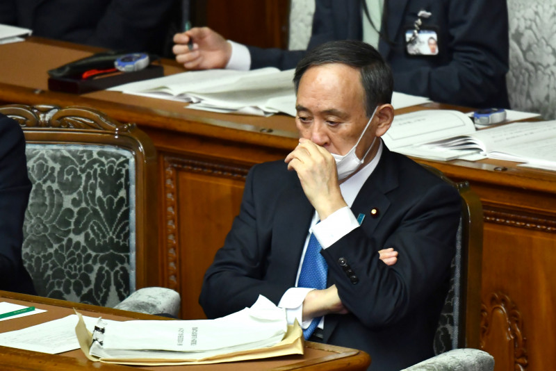 Japan cabinet approves bill for tougher virus measures