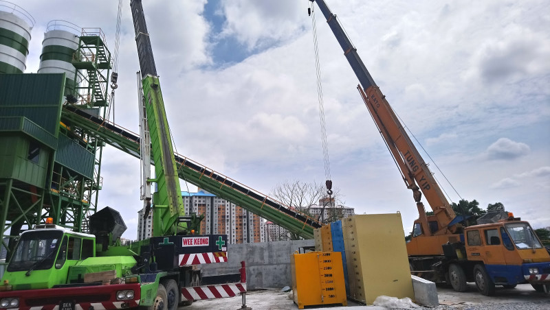 Site supervisor killed after crane crashes into car