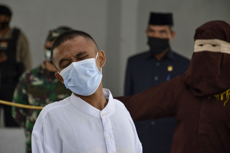 2 Christians flogged in Indonesia for drinking, gambling