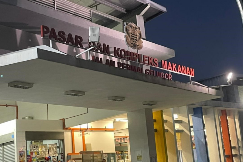 Residents risk trip to thermometer-less Gelugor market