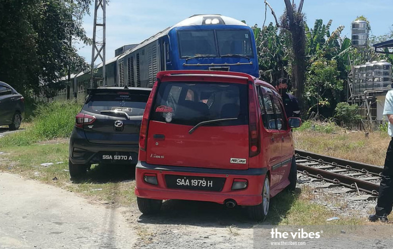 Inconsiderate drivers take illegal parking to the limit – near a train track