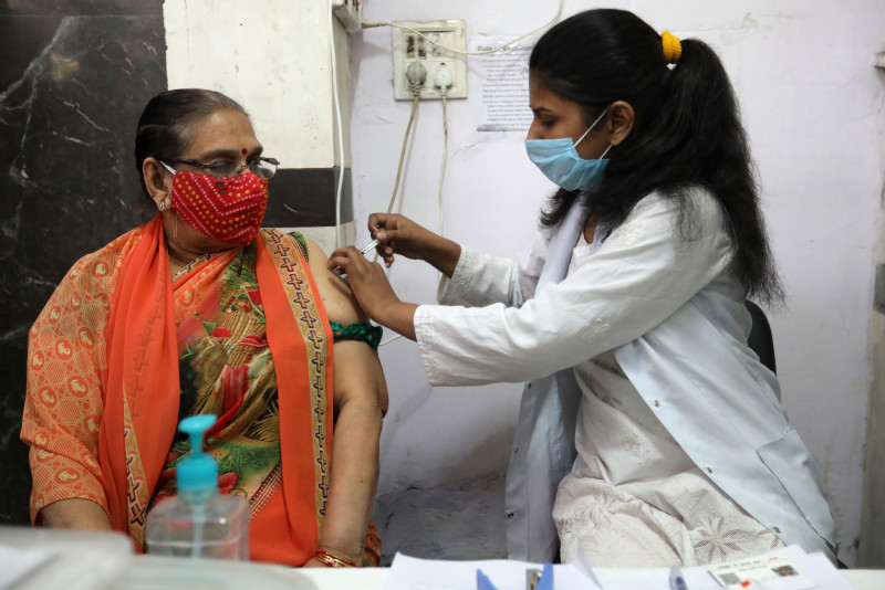 India opens up Covid-19 shots to all adults, as New Delhi goes into lockdown