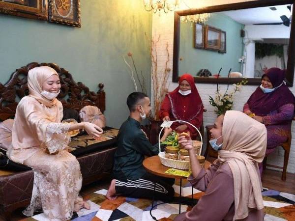 Unity and moderation the order of the day as Malaysians uphold Hari Raya traditions