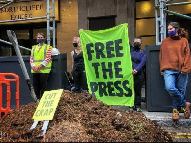 Manure dumped outside Daily Mail London HQ in climate protest